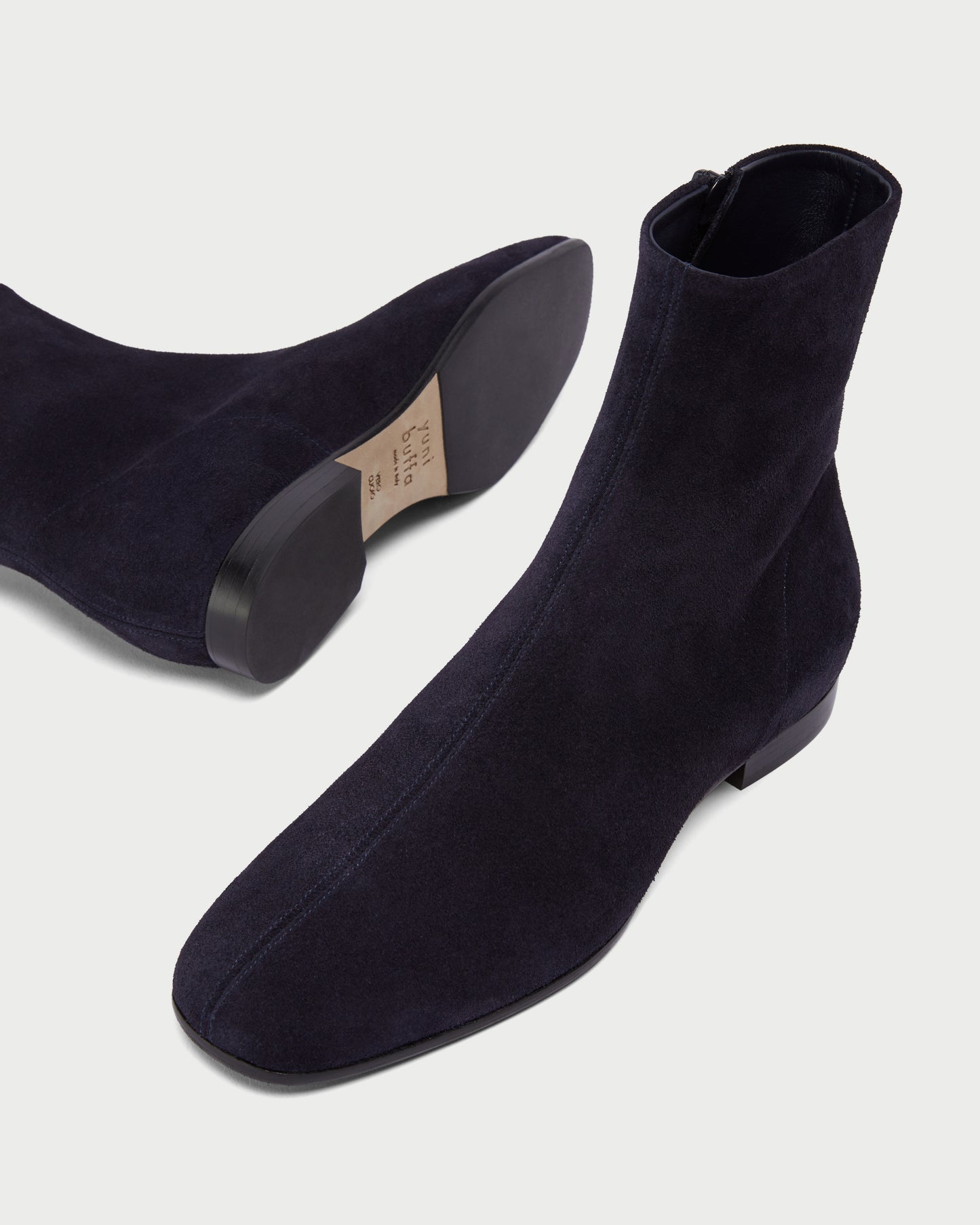 Top and Sole View of Nightingale Boot in Midnight Blue Suede