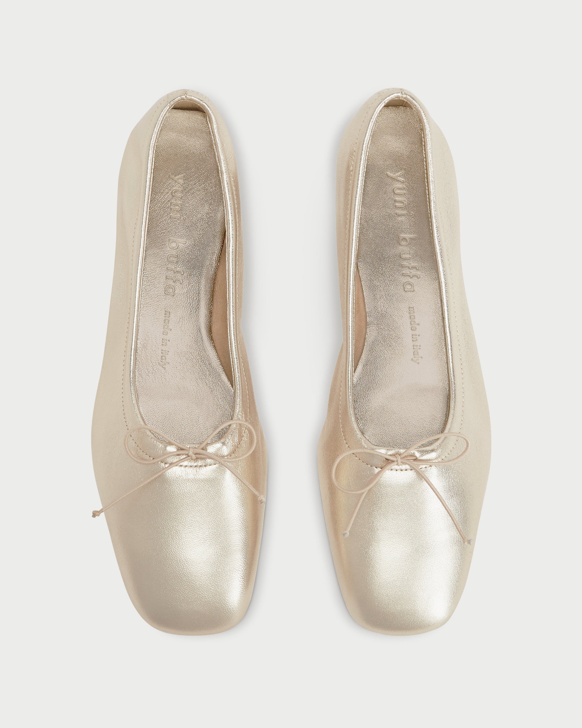 Top view of Pia Ballerina Comet flats with bow detail