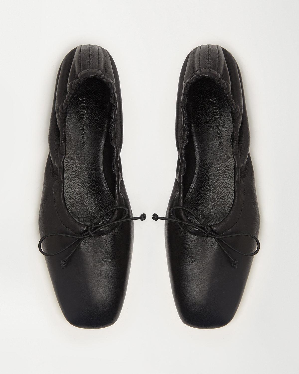 Side view of Pia Ballerina Flats in Black