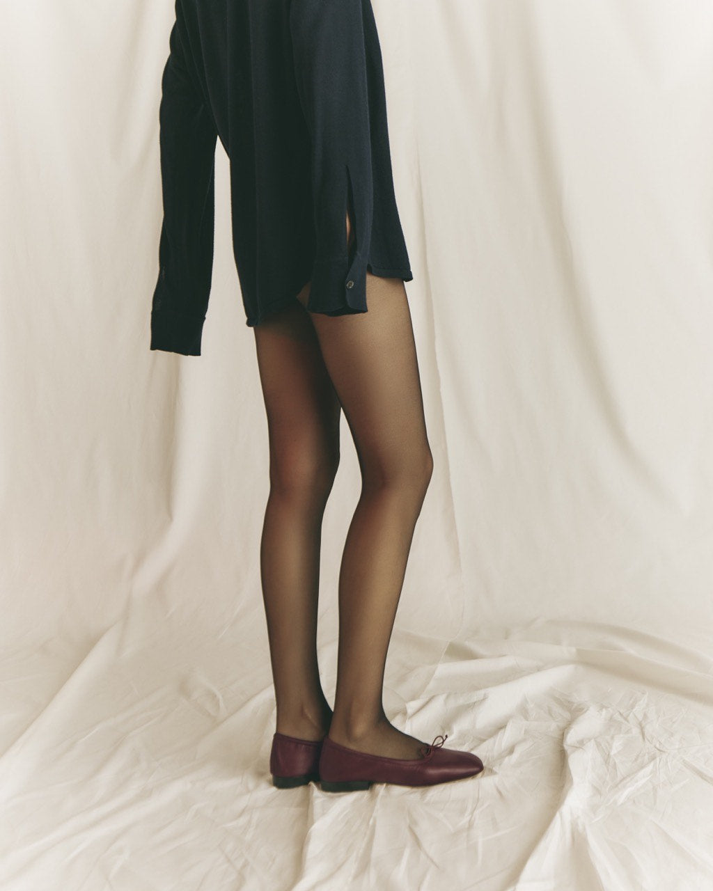 Model wearing Pia Ballerina Burgundy flats