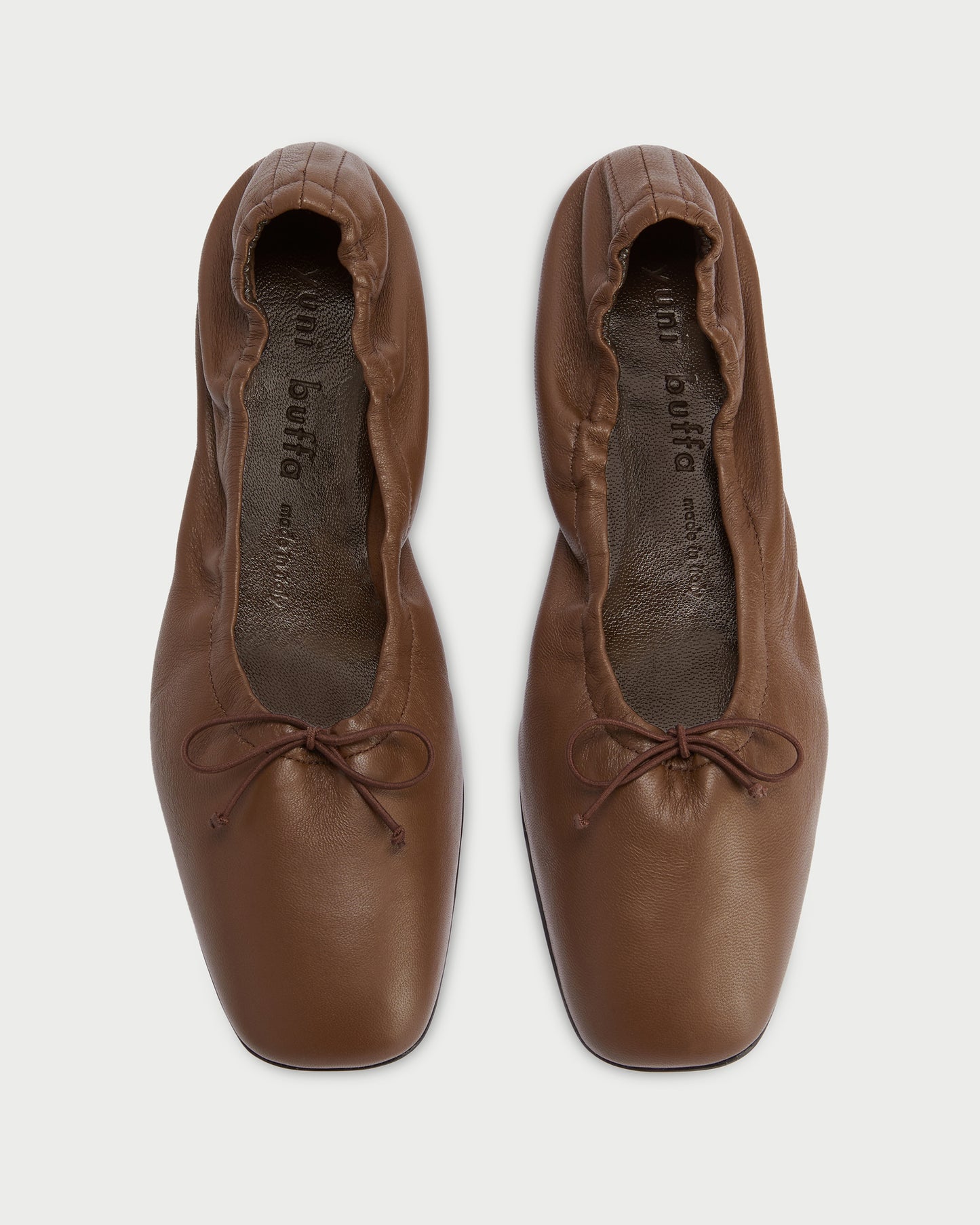 Top view of Pia Ballerina Saddle Brown flats with bow