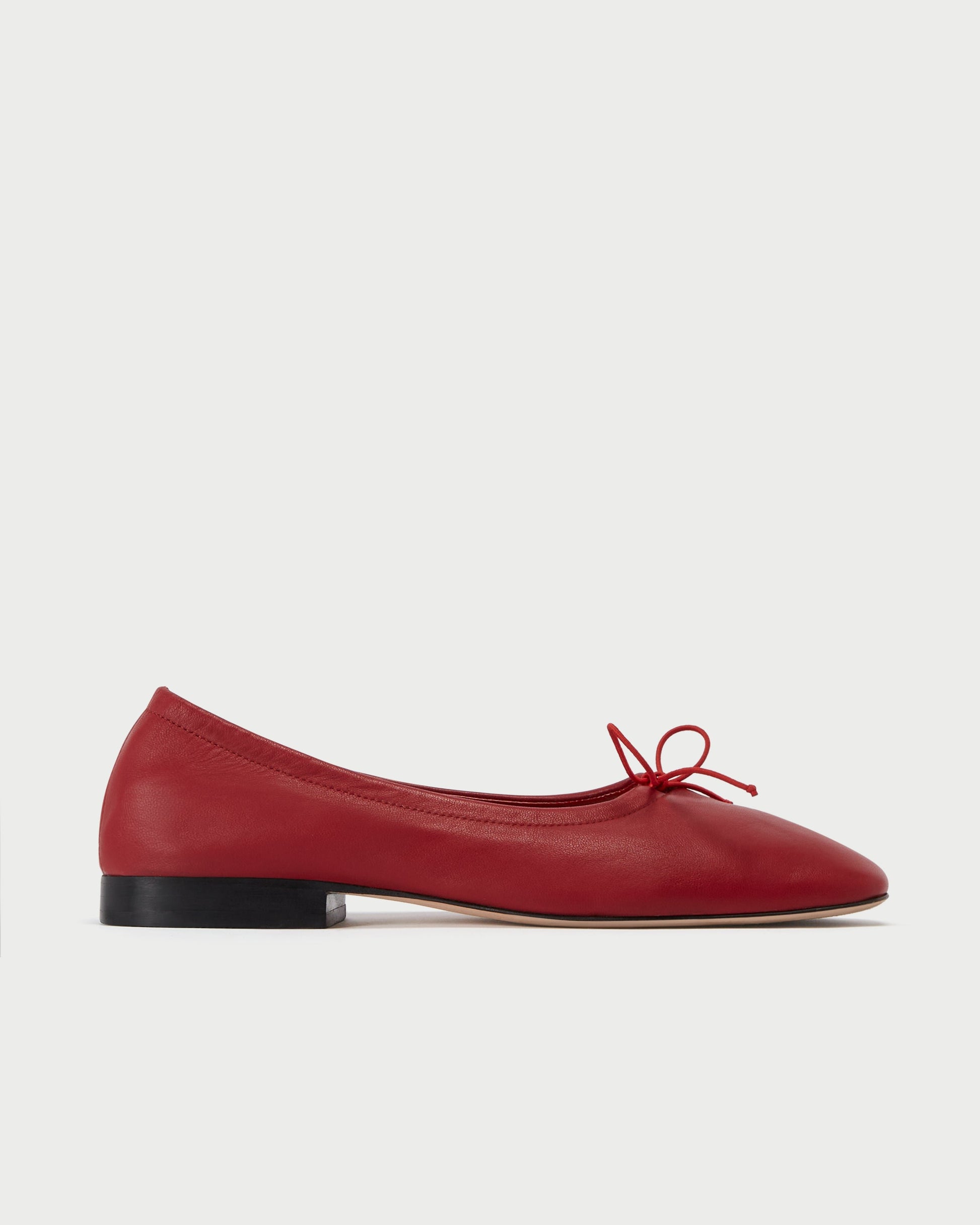 Side view of Pia Ballerina Cherry flats in soft leather