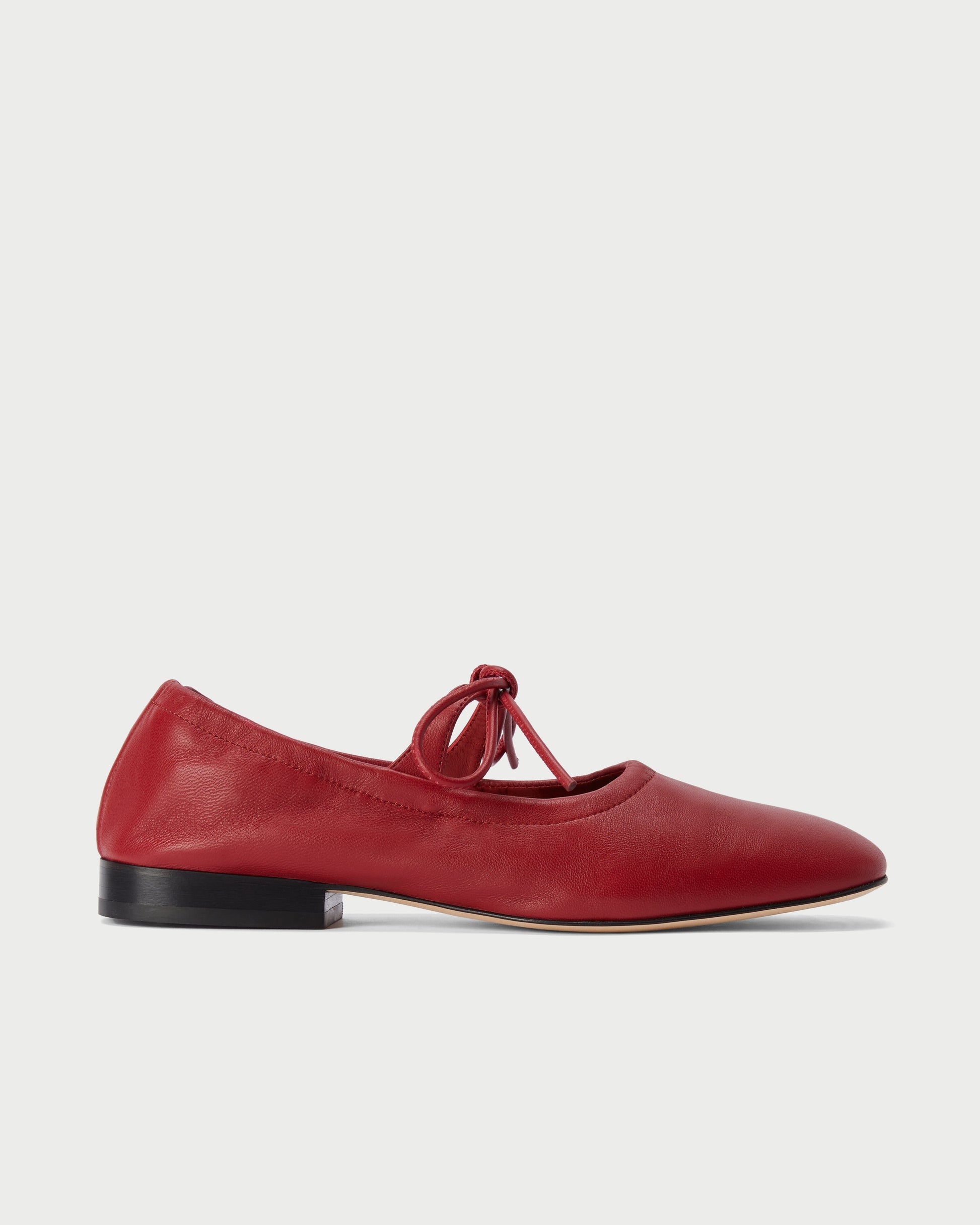 Side view of Lola Mary Jane Cherry flats in soft leather