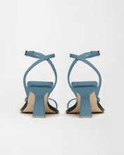 Load image into Gallery viewer, Back view of designer women&#39;s sandals Yuni Buffa Castrise strappy sandal high Heel in Bermuda blue color made in Italy with Italian Lamb Nappa leather and silver logo buckle