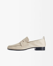 Load image into Gallery viewer, Side view of Yuni Buffa Fez Penny Loafer in Ecru Beige leather. Artisanal crafted women designer loafer shoe made in Italy with Italian Lamb Nappa leather.