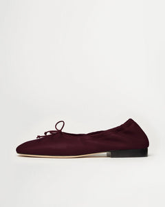 Side view of Yuni Buffa Pia Ballet flat designer shoes in Burgundy. Luxury hand crafted square toe ballet flats made in Italy with Italian soft Lamb Nappa leather.