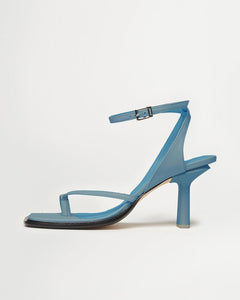 Side view of Yuni Buffa Castrise Heel in Bermuda blue color made in Italy with Italian Lamb Nappa leather and silver logo buckle