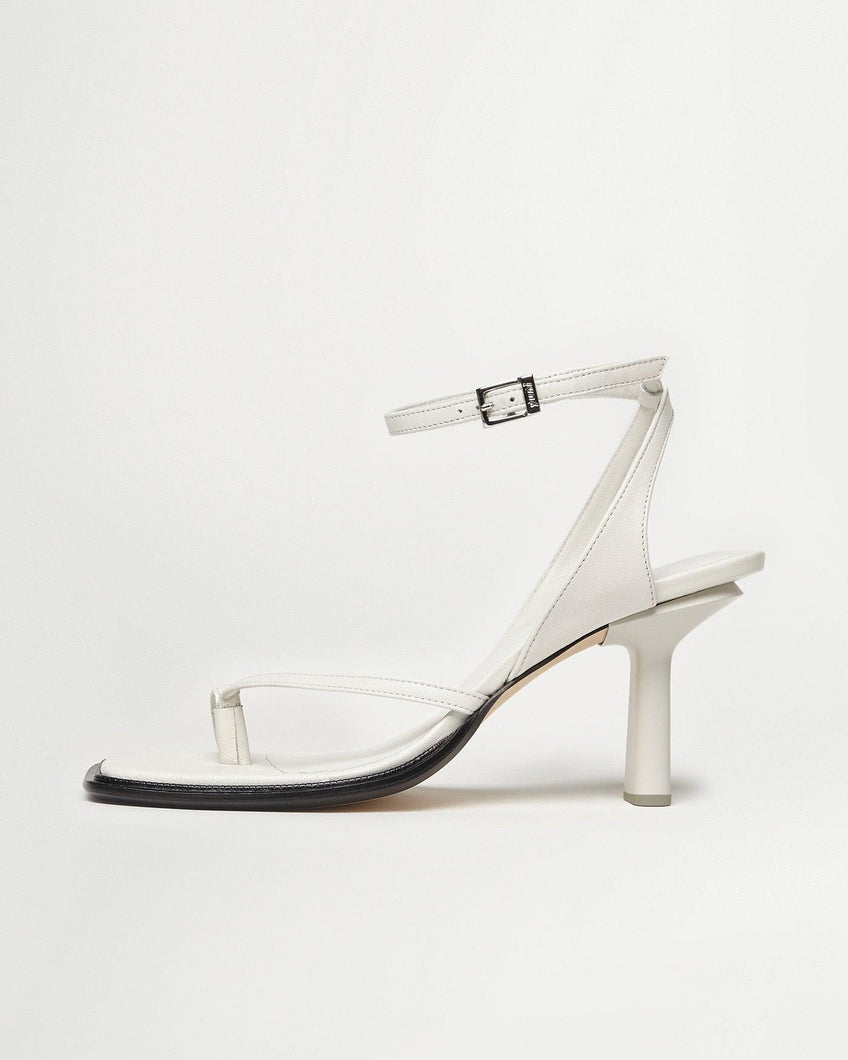 Side view of Yuni Buffa Castrise Heel in Cloud white color made in Italy with Italian Lamb Nappa leather and silver logo buckle