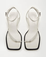 Load image into Gallery viewer, Top view of designer sandals Yuni Buffa Castrise strappy sandal high Heel in Cloud White color handmade in Italy with Italian Lamb Nappa leather and silver logo buckle