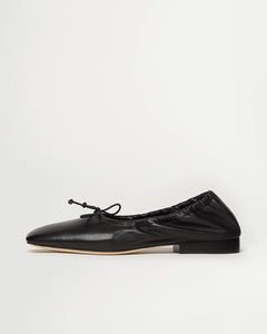 Side view of Yuni Buffa Pia Ballet flat designer shoe in Black. Luxury hand crafted square toe ballet flats made in Italy with Italian soft Lamb Nappa leather.
