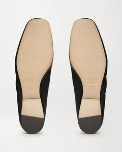 Bottom view of Yuni Buffa Pia Ballet flat designer shoe in Black. Luxury handmade square toe ballet flats made in Italy with Italian soft Lamb Nappa leather.