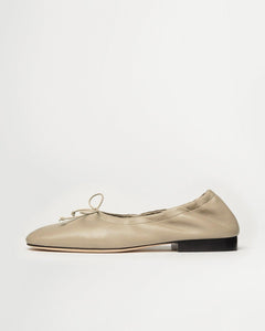 Side view of Yuni Buffa Pia Ballet flat designer shoes in Sahara Grayish Nude. Luxury hand crafted square toe ballet flats made in Italy with Italian soft Lamb Nappa leather.